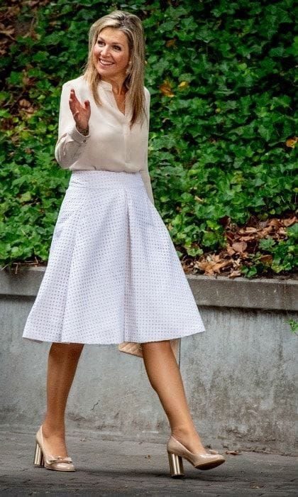 Queen Maxima of the Netherlands looked lovely as she arrived at scouting group Hubertus Brandaan for the start of the international scouting event Roverway in Voorburg on July 10. The 47-year-old royal rocked a sophisticated beige top and white pleated skirt, which she expertly paired with matching shiny heels.
Photo: Patrick van Katwijk/Getty Images