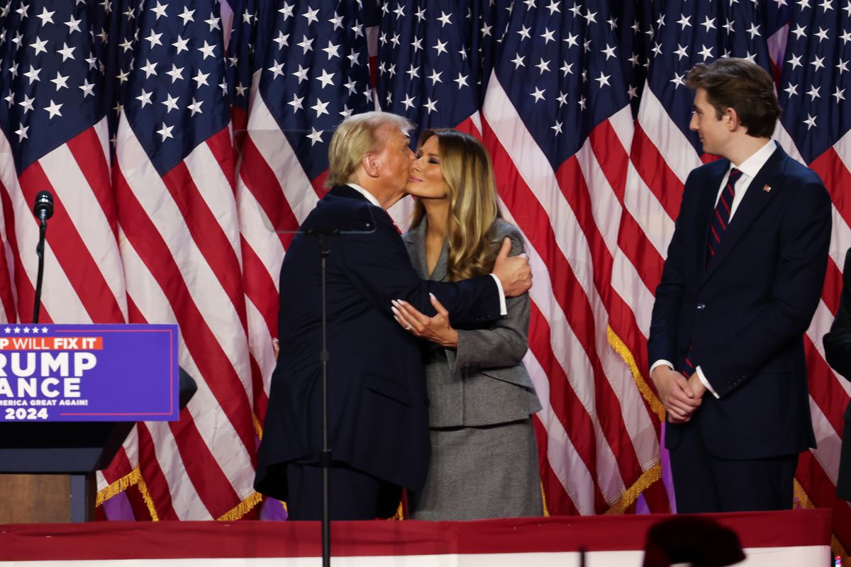 Donald Trump alongside his wife Melania Trump and their son Barron Trump