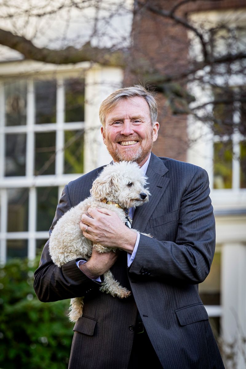 AMSTERDAM, NETHERLANDS - NOVEMBER 29: King Willem-Alexander of The Netherlands with his dog Mambo during a photo session in the city center on November 29, 2024 in Amsterdam, Netherlands. (Photo by Patrick van Katwijk/Getty Images)