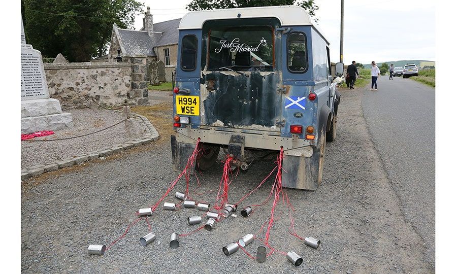 In line with tradition, the Range Rover had been decorated with empty cans that clanged as the couple drove the rural roads to head to Rose's family estate, Wardhill Castle, to celebrate the reception with their loved ones.
Photo: Getty Images