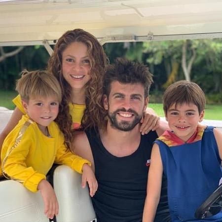 Shakira and Gerard Pique pose with their sons