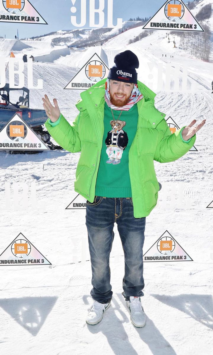 Angus Cloud wearing a stylish neon green jacket in snowy Utah