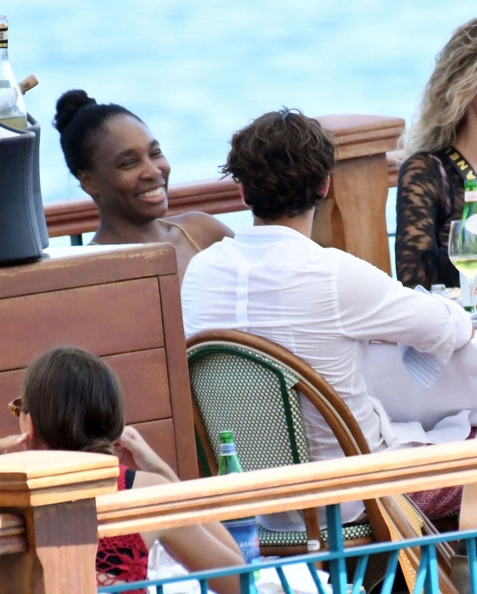 Venus Williams takes in the warm Italian sunshine in the company of  Andrea Preti 