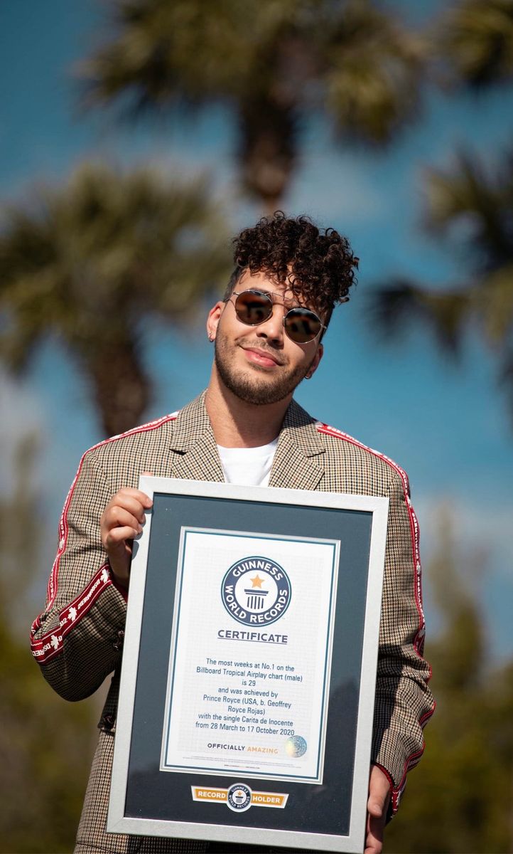 Prince Royce holding the Guinness World Records for most weeks at No. 1 on Tropical Airplay chart.