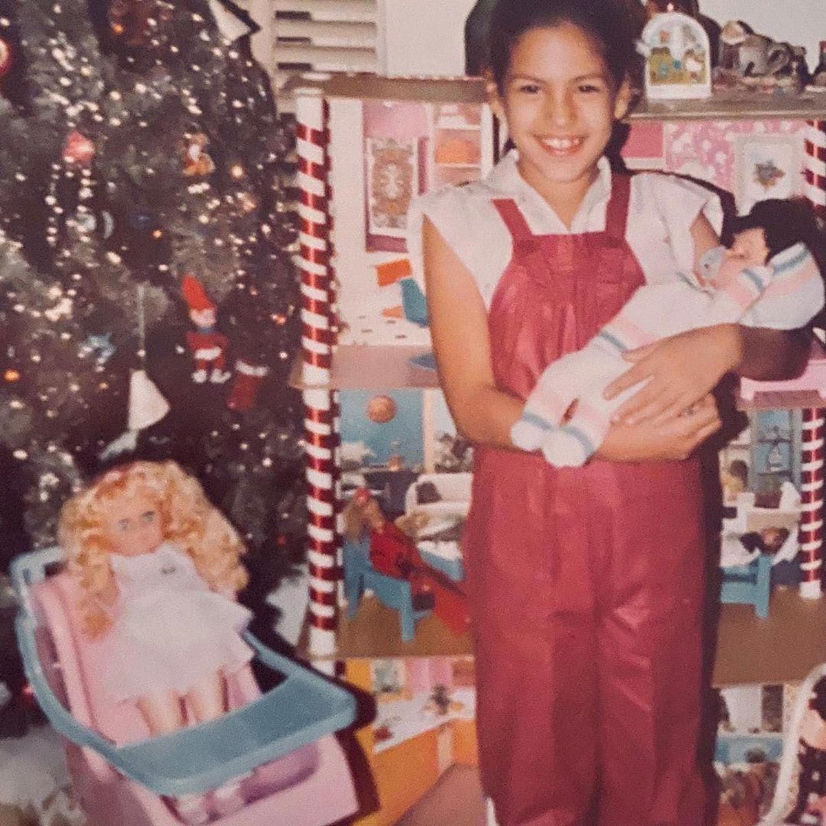 Eva Mendes cute throwback picture with a doll