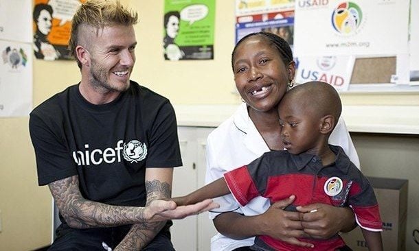 David, pictured in 2009, visiting Cape Town with Unicef