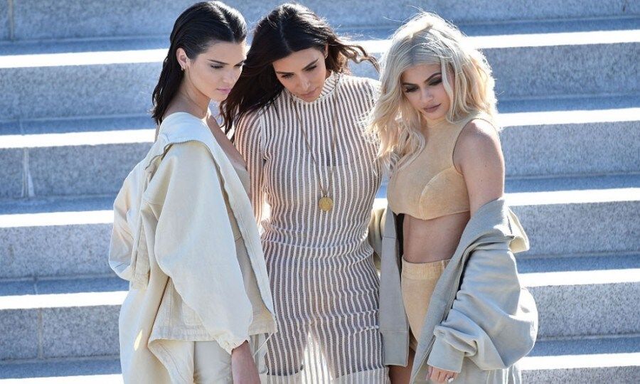 Kanye's angels! Kendall Jenner, Kim Kardashian and Kylie Jenner posed prior to taking their seats at the Yeezy Season 4 show.
Photo: Bryan Bedder/Getty Images for Yeezy Season 4