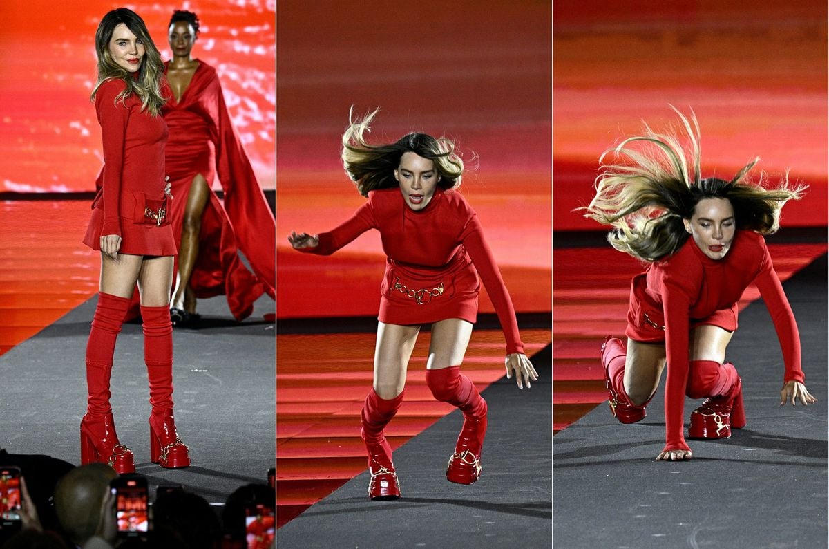 
Spanish-Mexican singer and actress Belinda falls down during the presentation of a creation for L'Oreal Paris show "Walk Your Worth" as part of the Paris Fashion Week Women Ready-to-wear Spring-Summer 2025 collection at Palais Garnier (Opera national de Paris) opera house, in Paris on September 23, 2024..  (Photo by JULIEN DE ROSA / AFP) (Photo by JULIEN DE ROSA/AFP via Getty Images)