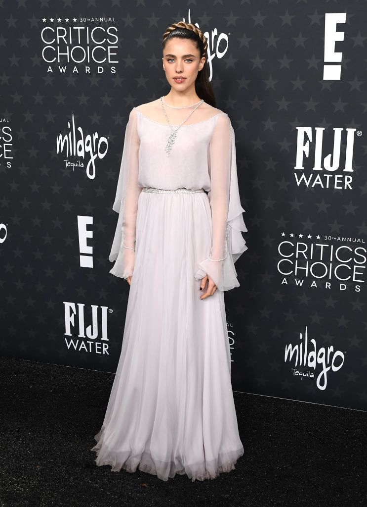 Margaret Qualley in a flowing silhouette by Chanel.