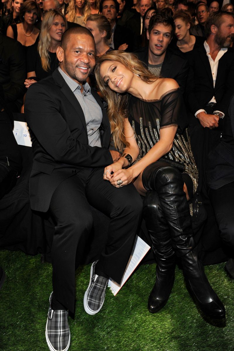 Benny Medina and Jennifer Lopez attend TOMMY HILFIGER Spring 2011 Fashion Show at Lincoln Center- The Theatre on September 12, 2010. (Photo by MARC DIMOV/Patrick McMullan via Getty Images)