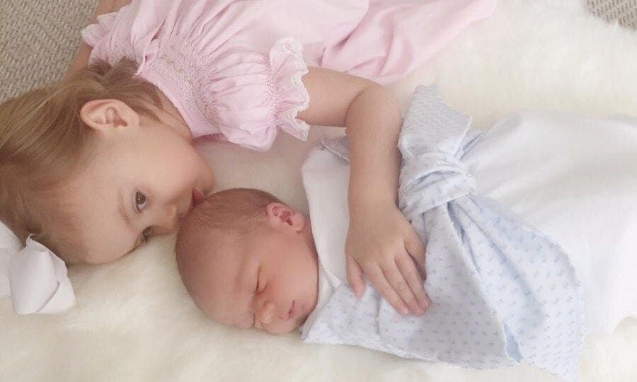 Almost two weeks after his birth, Armie and Elizabeth Hammer have revealed their newborn son's name in an adorable Instagram.
Elizabeth posted the photo first, writing: "Emerging from his sister's smooches to say hello. Welcome to the world, Ford Douglas Armand Hammer!"
Baby Ford is seen swaddled on a bed with his 2-year-old sister Harper snuggling up to him.
Photo: Instagram/@thisisechambers