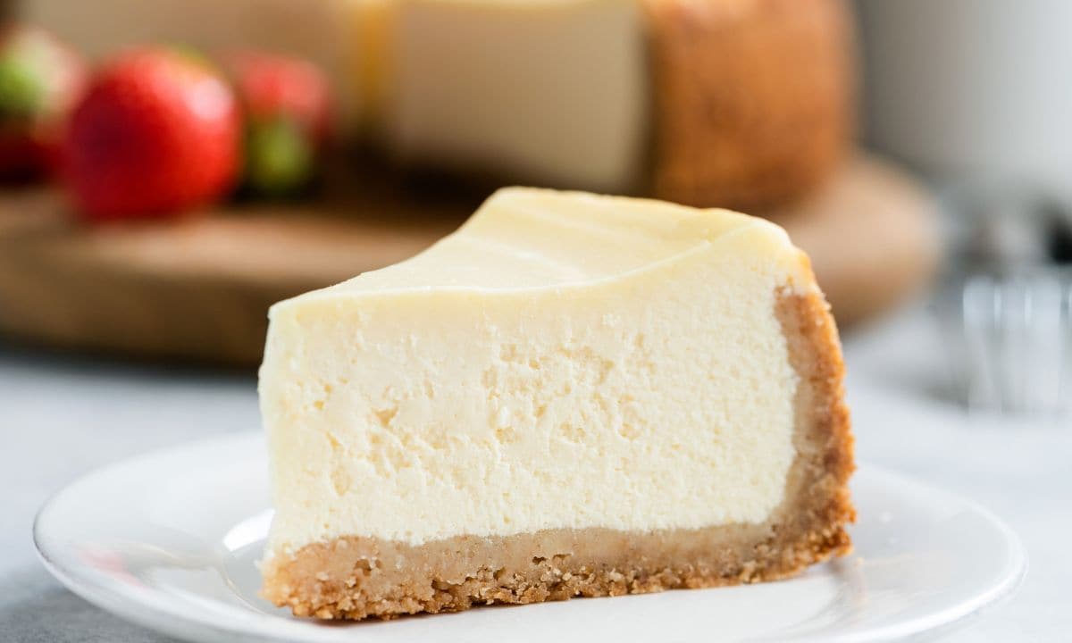 Enjoy a piece of cheesecake with this classic baked cheesecake recipe