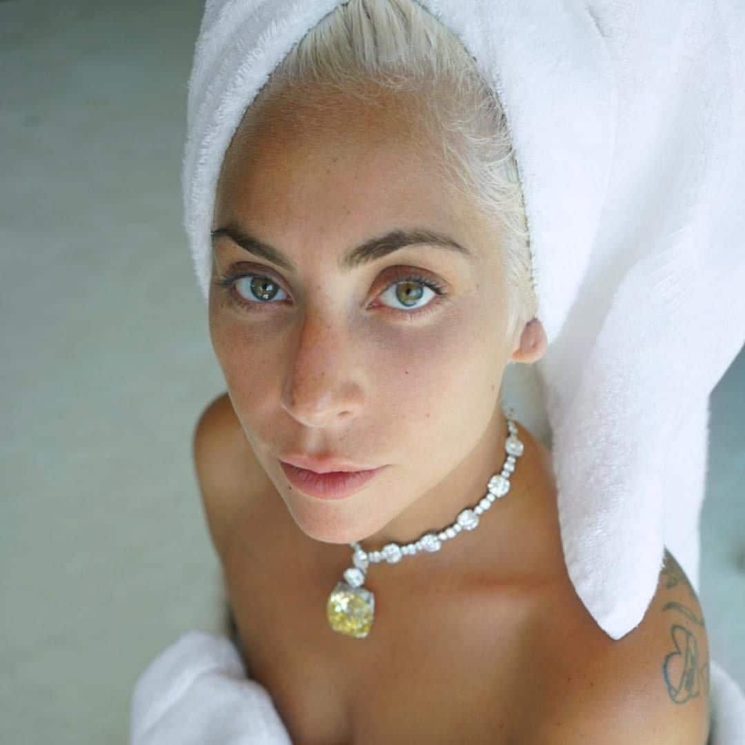 Lady Gaga without makeup and with a diamond necklace