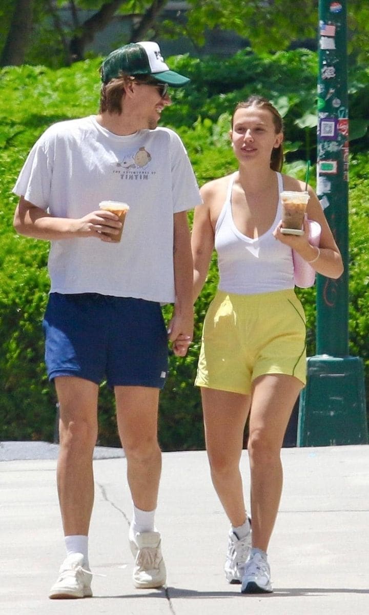 PDA Alert! Millie Bobby Brown and her husband Jake Bongiovi are all smiles as they look all loved up while sharing a tender kiss during a romantic stroll in Manhattanâ€™s SoHo neighborhood