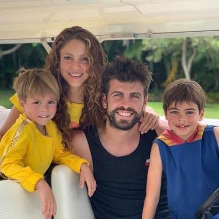 Shakira and Gerard Pique pose with their sons