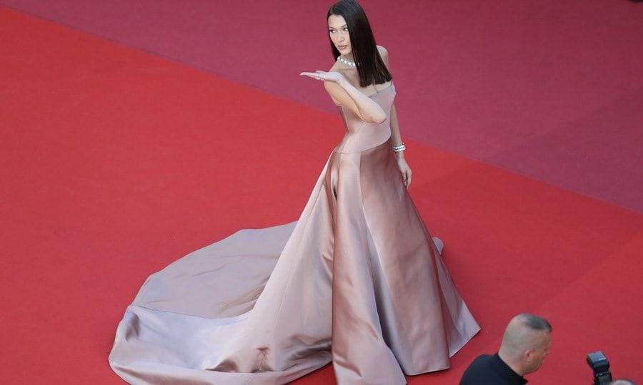 Bella Hadid blew kisses to photographers while on the carpet for <i>Ash is the Purest White</i> premiere. The night before the May 11th carpet, the supermodel was spotted kissing someone else at a Cannes after-party, her ex The Weeknd.
Photo: Getty Images