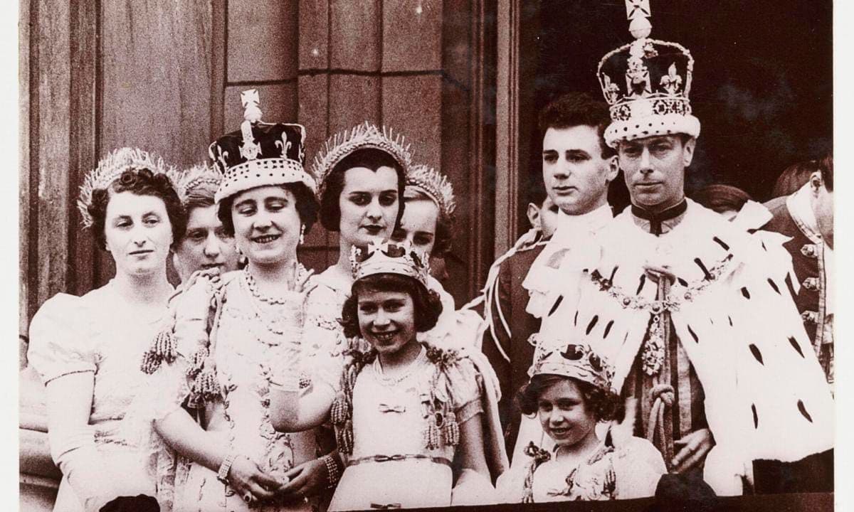 After her uncle King Edward VIII abdicated in 1936, Elizabeth's father became King. The family is pictured on the balcony of Buckingham Palace after King George VI's coronation in 1937.