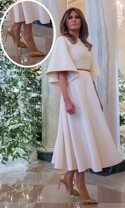 Unveiling the White House holiday decorations on November 27 as she prepared to celebrate her first-ever Christmas as first lady, Melania donned an angelic white bell-sleeved dress by Christian Dior. The President's wife added a touch of festive elegance with a vintage gold belt and gold Manolo Blahnik heels.
Photo: Getty Images