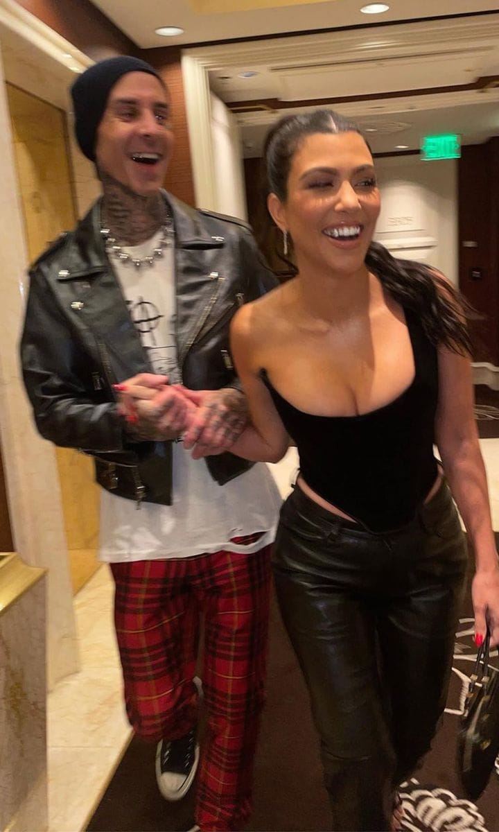 Travis Barker and Kourtney Kardashian run through a hotel in Las Vegas