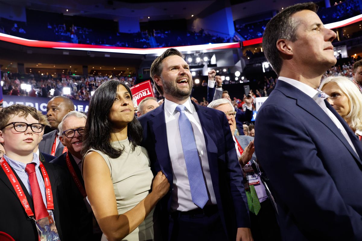 Sen. J.D. Vance (R-OH) and his wife, Usha Chilukuri Vance, look on as he is nominated for the office of Vice President on the first day of the Republican National Convention at the Fiserv Forum on July 15, 2024, in Milwaukee, Wisconsin. Delegates, politicians, and the Republican faithful are in Milwaukee for the annual convention, concluding with former President Donald Trump accepting his party's presidential nomination. The RNC takes place from July 15-18. 