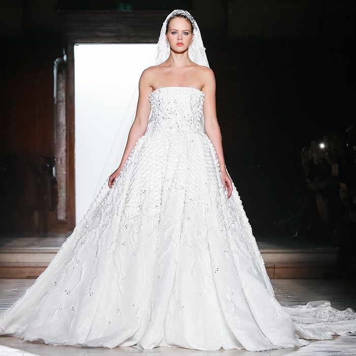 <b>TONY WARD</B>
Simple yet luxurious, the Tony Ward wedding dress that closed his spring-summer 2018 haute couture show boasts a sculpted, strapless bodice and cascade of exquisite beading.
Photo: Getty Images