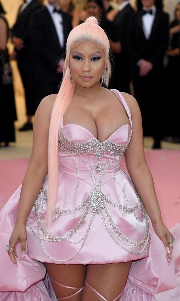 Nicki Minaj wearing a high pink ponytail