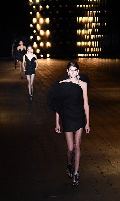 After working the runways of Milan, Kaia Gerber hightailed it to Paris where she walked in the Saint Laurent show modeling a chic LBD.
Photo: Getty Images