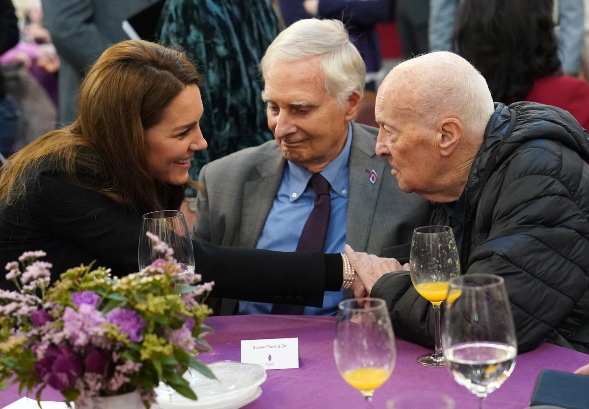 Britain's Catherine, Princess of Wales (L) meets Holocaust survivor Steven Frank (C) and Maurice Peltz during a ceremony to commemorate Holocaust Memorial Day and the 80th anniversary of the liberation of Auschwitz-Birkenau at the Guildhall in London on January 27, 2025. Holocaust Memorial Day is an internationally recognised date to remember the six million Jews murdered during the Holocaust, the millions of people killed under Nazi persecution and those killed in subsequent genocides. (Photo by Arthur EDWARDS / POOL / AFP) (Photo by ARTHUR EDWARDS/POOL/AFP via Getty Images)