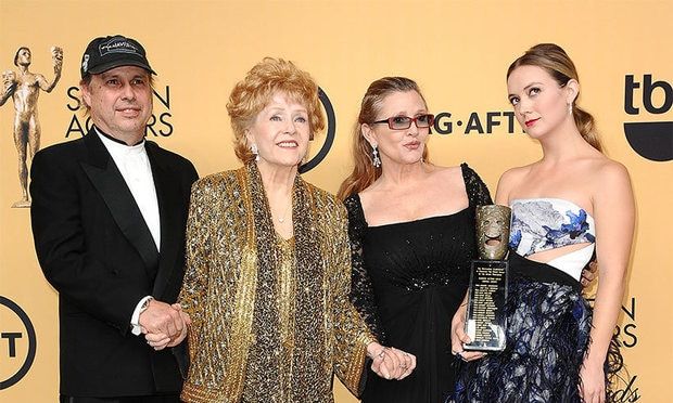 Billie, right, with uncle Todd Fisher, left, and her grandmother Debbie Reynolds and mom Carrie Fisher, who both tragically died last week.
Photo: Getty Images