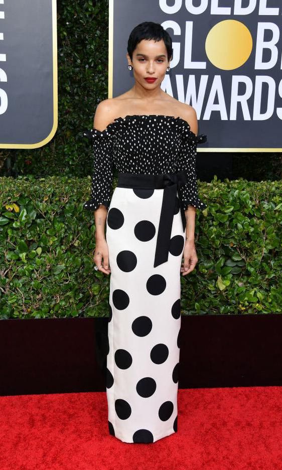 Zoe Kravitz in an off-the-shoulder dress with polka dots in varying sizes