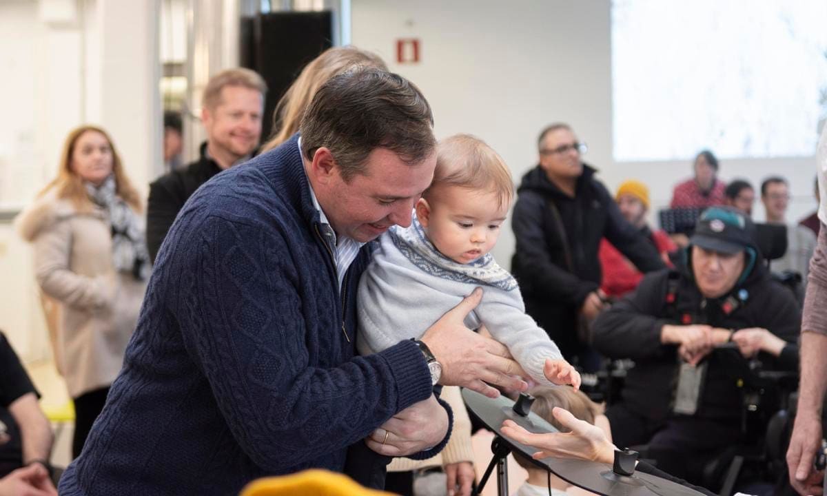 Francois looked adorable wearing a baby blue Fair Isle sweater.