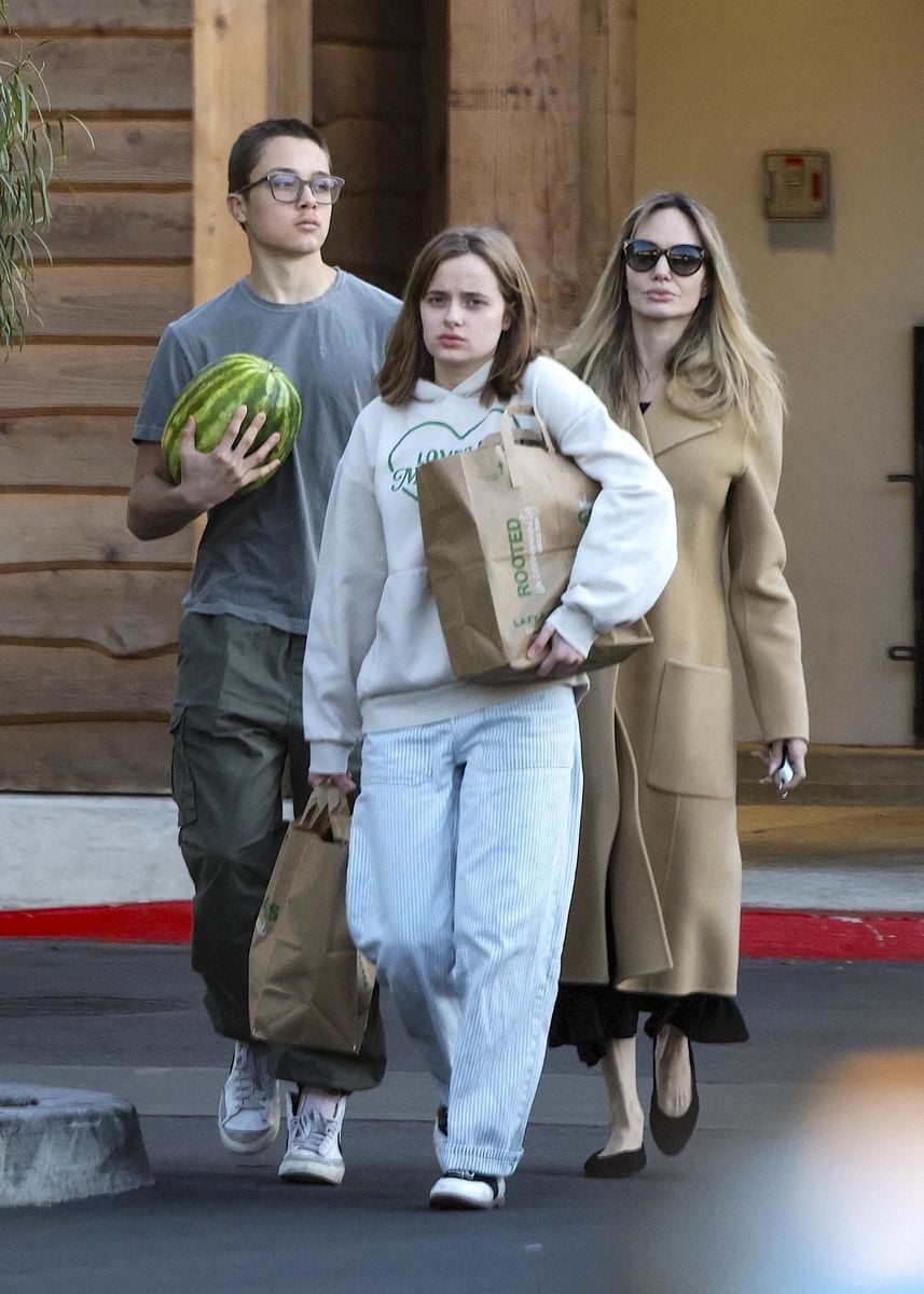 The trio kept it casual while picking up essentials during their outing.