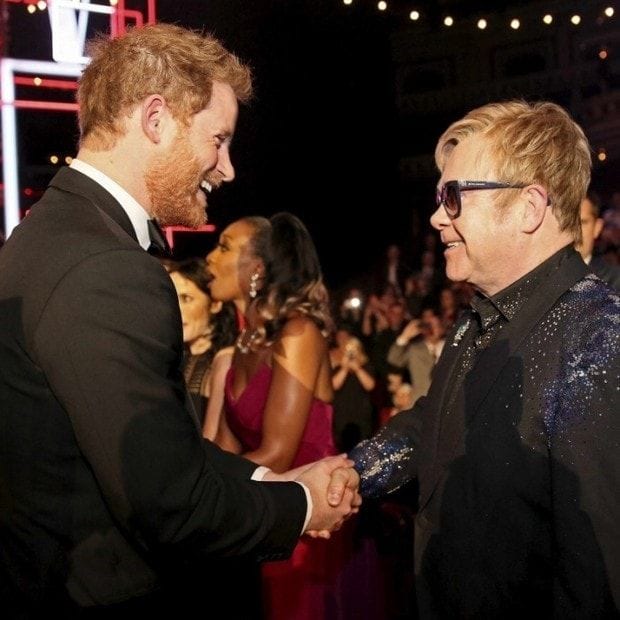 Prince Harry even made a cameo at the gala, appearing via video to wish Elton a happy day!
Seen here, Prince Harry and Elton talk at the Royal Variety Performance at Royal Albert Hall in London back in 2015.
Photo: PAUL HACKETT/AFP/Getty Images