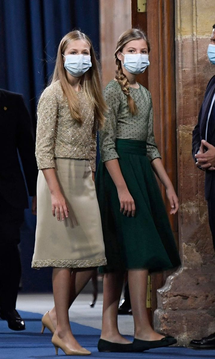 The royal siblings looked grown up at the 2020 Princess of Asturias Awards Ceremony. According to Elle Spain, the Spanish Princesses both wore two-piece sets. Leonor, who styled her golden locks down straight, chose a champagne colored skirt with a matching embroidered top, while Sofia wore a green skirt and polka dot blouse for the royal family affair.