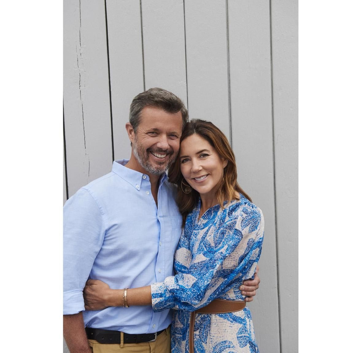 Crown Prince Frederik and Crown Princess Mary, wearing an H&M mosaic-patterned silk dress ($249), looked loved-up in a solo romantic shot.