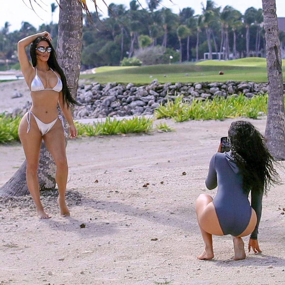 Kim Kardashian Poses in a Silver Bikini to Promote her New SKIMS swimsuit line