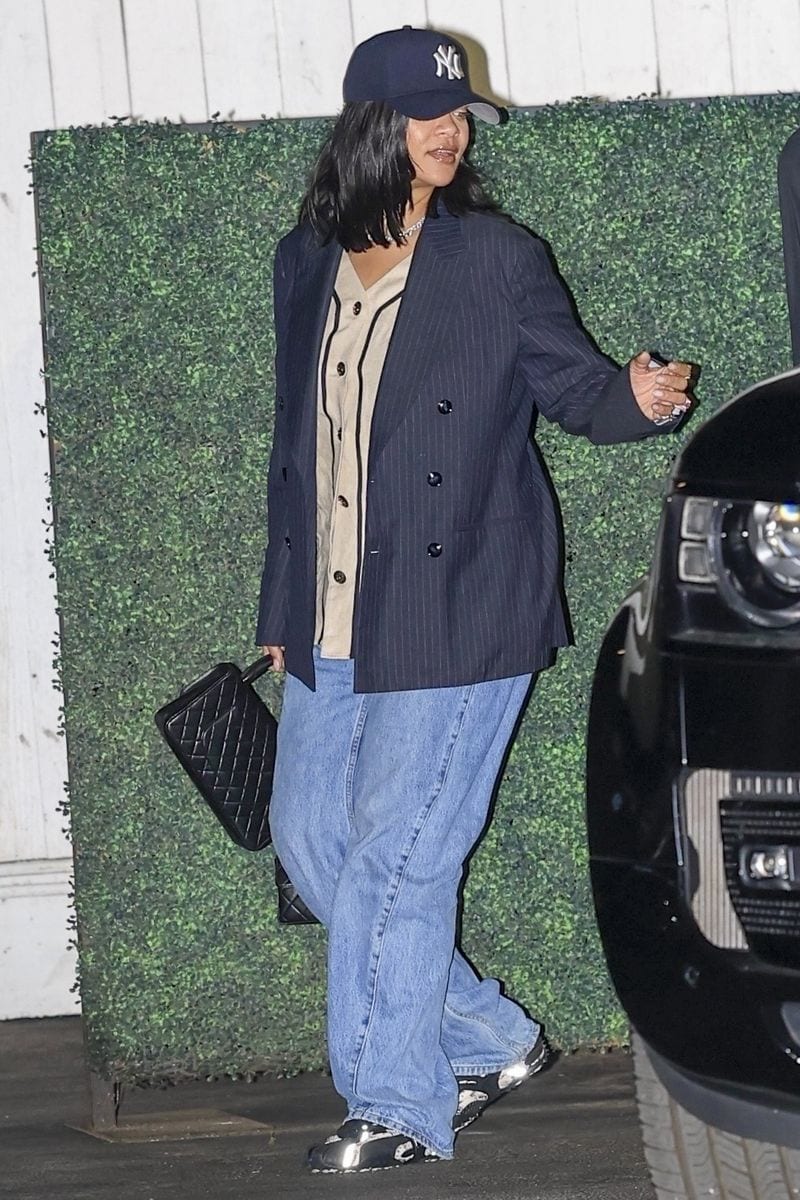 Rihanna was photographed leaving a dinner with friends in Santa Monica, wearing a huge ring on her left ring finger