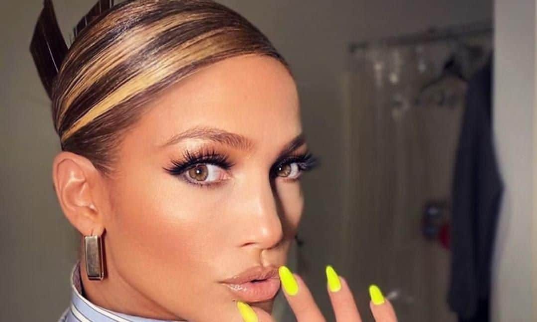 Jennifer Lopez showing off neon nails