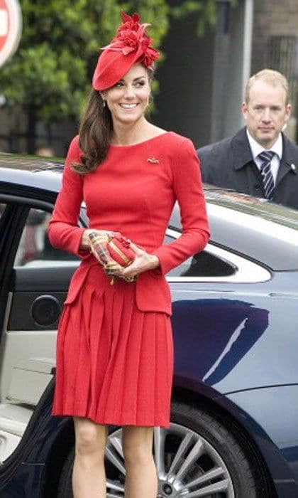 Kate makes a bold choice with this scarlet red Alexander McQueen outfit for the Queen's Diamond Jubilee celebration in 2012.
<br>
Photo: Getty Images