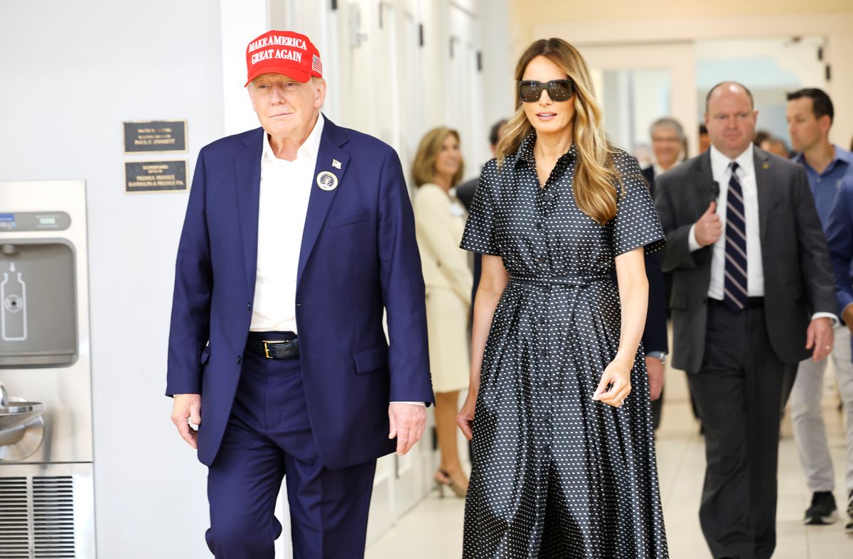 Donald Trump and his wife Melania Trump depart after casting their votes at a polling place in Palm Beach, Florida.