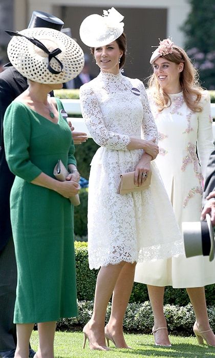 Catherine, Duchess of Cambridge attended Ascot for the second time ever wearing a long-sleeved Alexander McQueen dress with a high collar and peplum waist. The royal accessorized with her signature nude accessories pumps and a clutch as well as a lace fascinator.
Photo: Chris Jackson/Getty Images