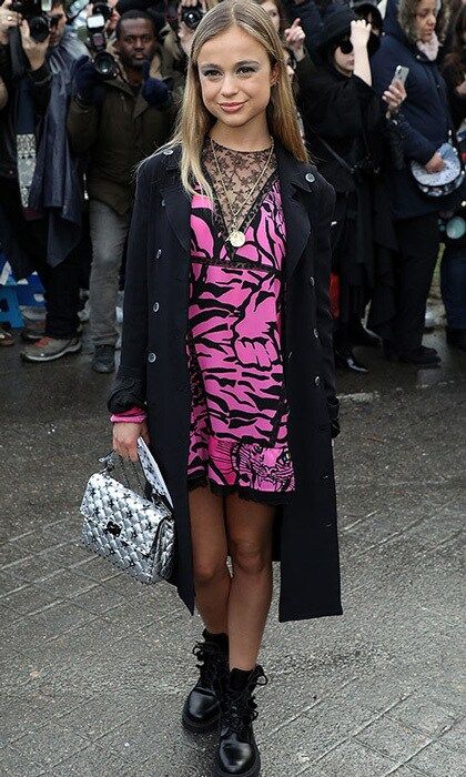 Lady Amelia Windsor wore an edgy pink dress with black biker boots to Valentino's fashion show, and accessorized with a handbag from the brand.
Photo: Getty Images