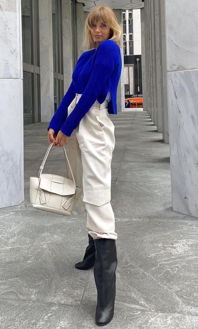 Xenia Adont in a Classic Blue sweater