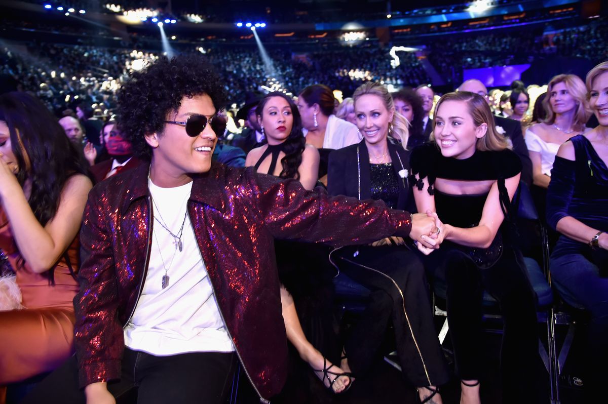 Bruno Mars and Miley Cyrus attend the 60th Annual GRAMMY Awards in 2018