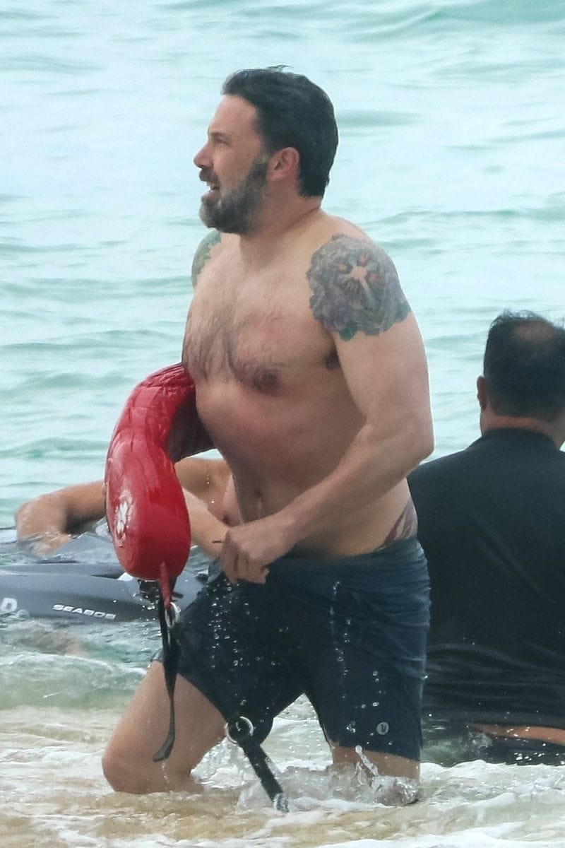 Photo © 2018 Backgrid/The Grosby Group
Spain: Lagencia Grosby
 
EXCLUSIVE
Honolulu, HI, March 15, 2018.
Ben Affleck shows off a huge back tattoo while filming "Triple Frontier." Ben was seen getting out of the ocean with life guard equipment as he sports three colorful tattoos: one on each shoulder, and a giant Phoenix on his back. All were seen training under the strict supervision of Hawaii lifeguards as they prepared for their new movie "Triple Frontier" which is being produced for Netflix.