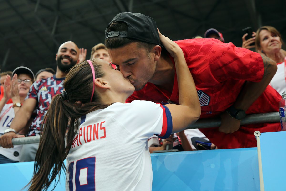 Alex Morgan of the USA celebrates with husband Servando Carrasco following her side's victory in the 2019 FIFA Women's World Cup France Final match between The United States of America and The Netherlands at Stade de Lyon on July 07, 2019 in Lyon, France. (Photo by Maddie Meyer - FIFA/FIFA via Getty Images)