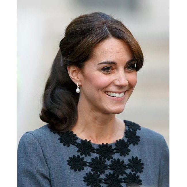 Princess Charlotte's mom gave fans around the world major hair inspiration when she met staff and children from charity Chance UK, sweeping her hair into a 1960s-inspired ponytail.
<br>
Photo: Getty Images