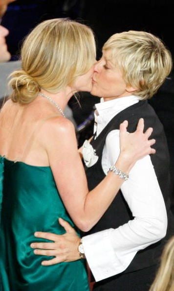Ellen DeGeneres and Portia De Rossi showed their love for one another at an awards bash.
Photo: Getty Images