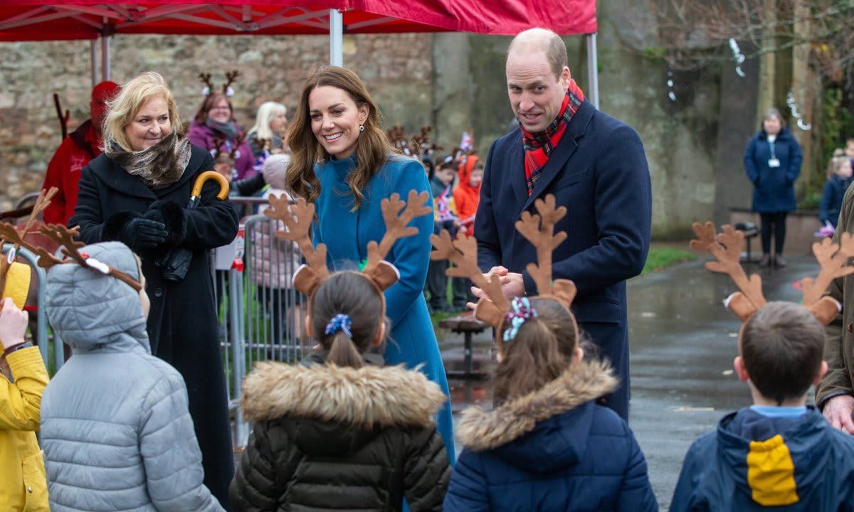 While the Duke and Duchess had the chance to meet real reindeer during the visit, they also greeted adorable children wearing reindeer antlers.