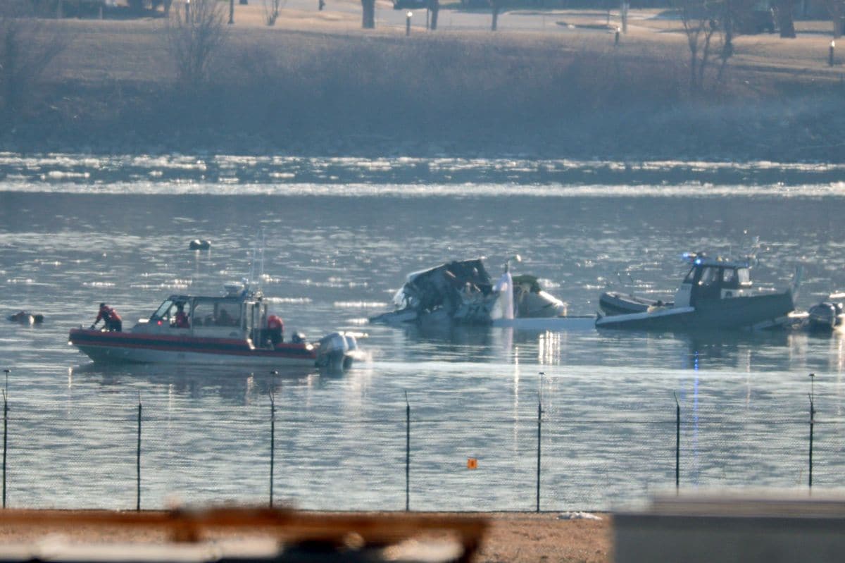 ARLINGTON, VIRGINIA - JANUARY 30:  Emergency response units search the crash site of an American Airlines plane on the Potomac River after an accident last night while on approach to Reagan National Airport on January 30, 2025 in Arlington, Virginia. The American Airlines flight from Wichita, Kansas collided midair with a military Black Hawk helicopter while on approach to Ronald Reagan Washington National Airport. According to reports, there were no survivors among the 67 people on both aircraft.  (Photo by Kayla Bartkowski/Getty Images)